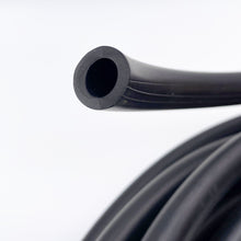 Load image into Gallery viewer, Load image into Gallery viewer, close up image of black rubber driveway tubing 
